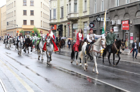 People in traditional costumes ride horses as they take part in a parade in a street of Bosnia, Herzegovina on June 27.