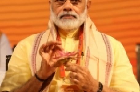 Not afraid of being in same frame as an industrialist: Modi